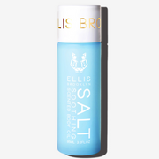 Huile pour le corps parfumée apaisante Salt 95 ml sur fond blanc.