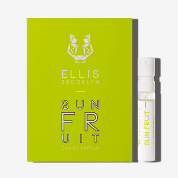 Sun Fruit 1.5ml Eau De Parfum Vial next to yellow green Sun Fruit Eau De Parfum vial holder card. | english_image