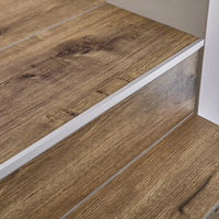 Lifestyle image stair profile Squarestep aluminium silver with ribbed surface