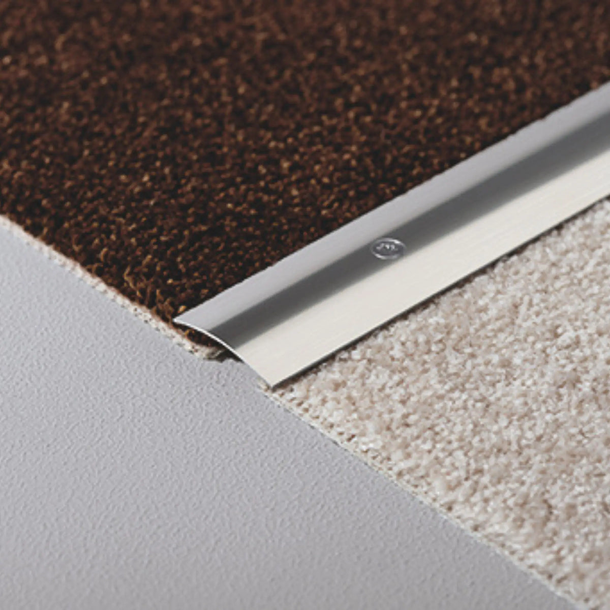Lifestyle image transition profile stainless steel screw-fixable between two carpets