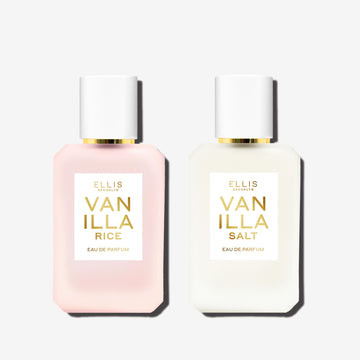 50mL bottle of Vanilla Rice eau de parfum next to a 50mL bottle of Vanilla Salt eau de parfum set in front of a white background. 